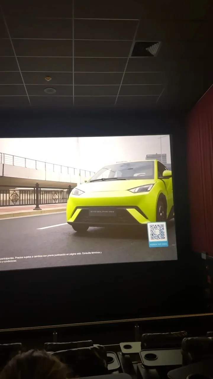 A BYD advertisement on a cinema screen, photographed by Godspeed
