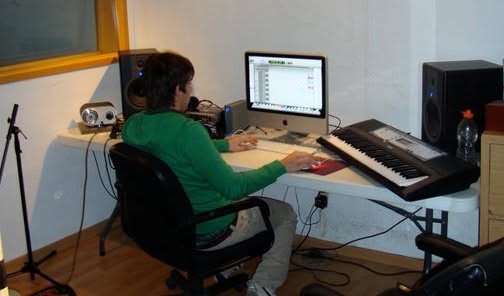 Victor at the computer in Toño Pérez’s studio, 2009–2010